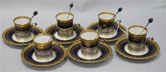 An Aynsley gilt and blue coffee set with silver holders and spoons